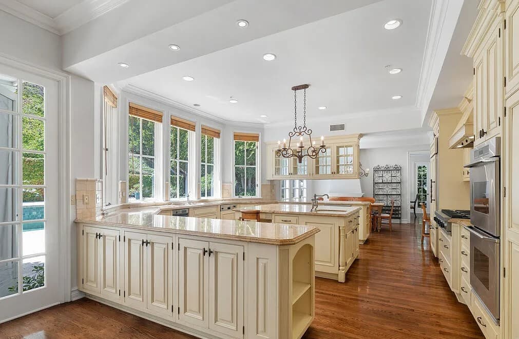 Bienveneda Estate restored kitchen with custom cabinetry and hardwood floors