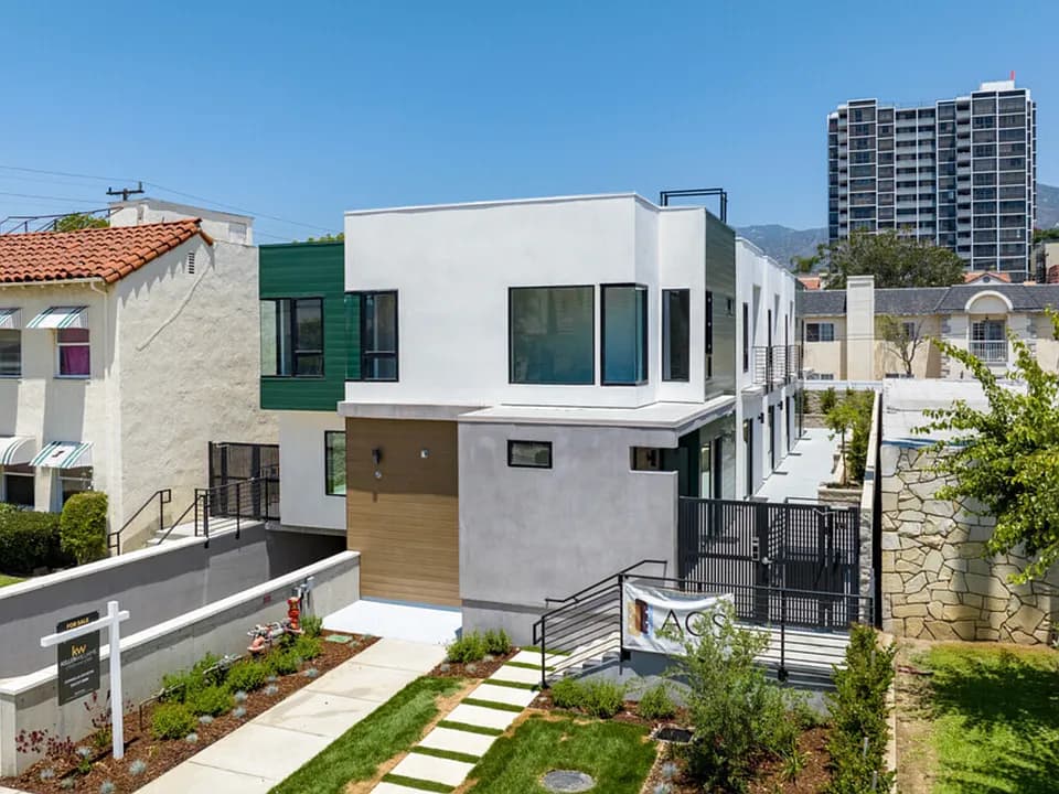 Contemporary townhome development with landscaped entrance in Los Angeles