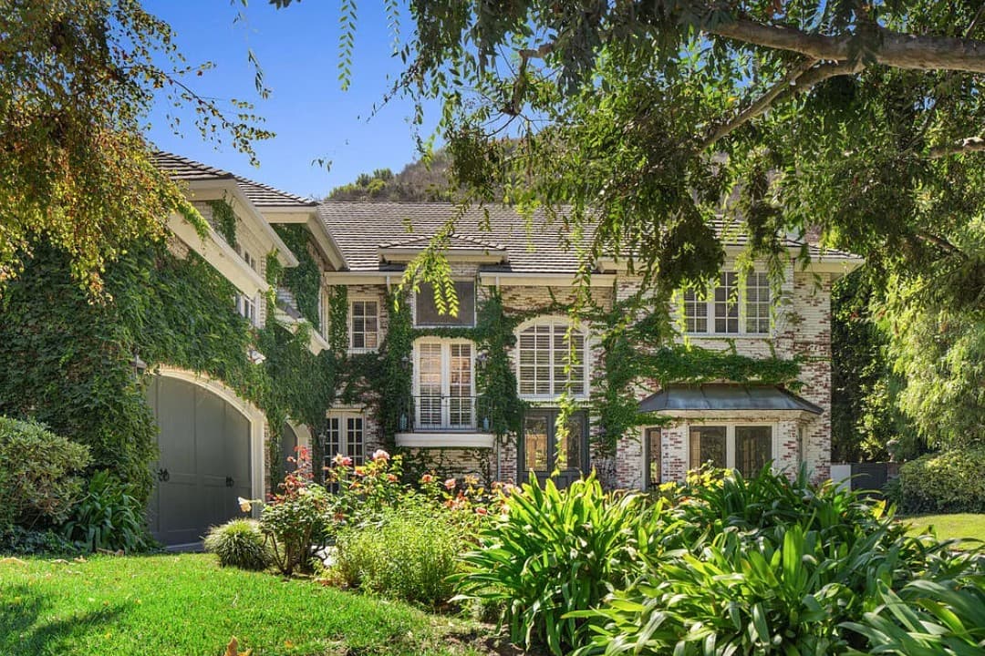 Bienveneda Estate Country French Traditional brick facade in Pacific Palisades